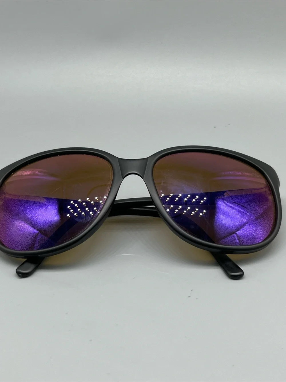 Revo Matte Black Sunglasses with Purple Mirrored Lenses